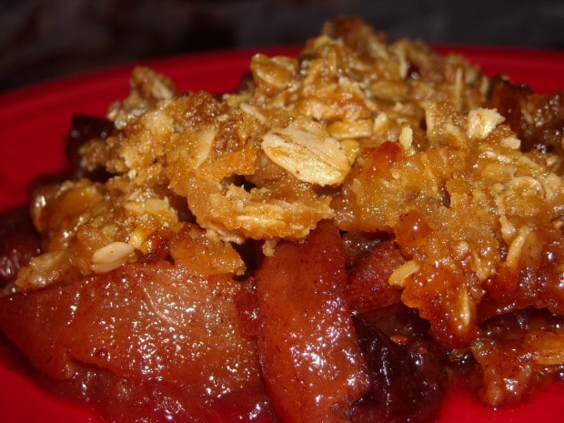 Slow Cooker Fruit Crisp by Nutmeg Nanny This sweet slow cooker fruit crisp is full of apples, pears and lots of flavorful cinnamon. Ready in just 4 hours and will leave your house smelling amazing.