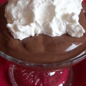 This delicious homemade chocolate pudding is packed full of rich chocolate flavor and is simply made on the stove top. Serve it warm or cold.