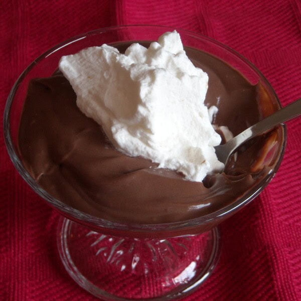 This delicious homemade chocolate pudding is packed full of rich chocolate flavor and is simply made on the stove top. Serve it warm or cold.