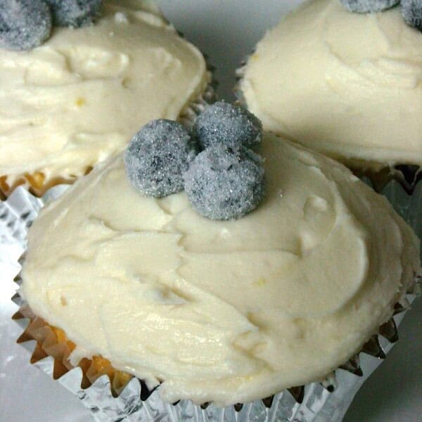 These lemon blueberry cupcakes are perfect balance of sweet and tart. Topped with lemon buttercream and homemade sparkly sugared blueberries.