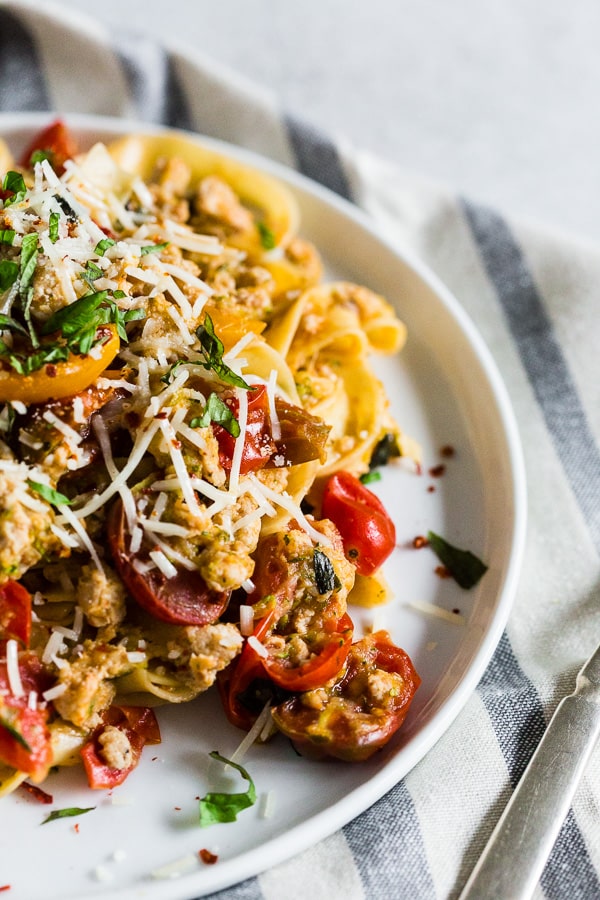 Summer Bolognese on a white plate. 