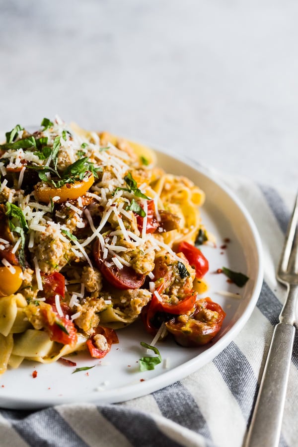 Summer Bolognese sprinkled with shredded parmesan cheese. 