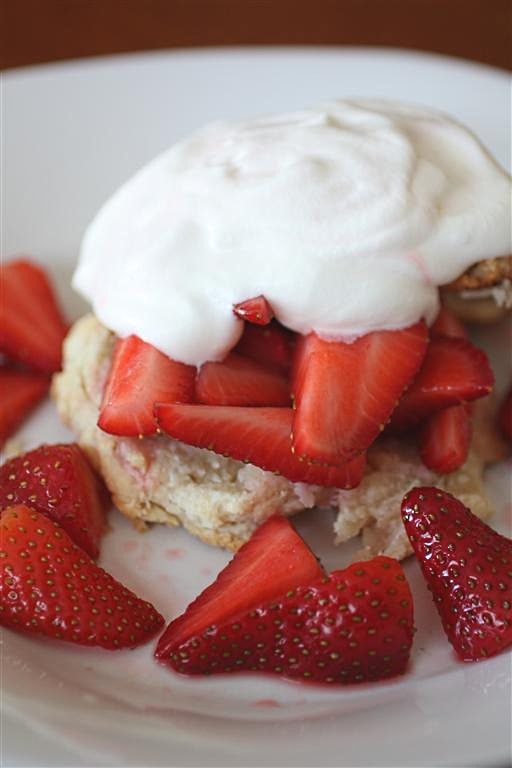 This strawberry shortcake is the perfect summertime dessert. Full of sweet strawberries, homemade biscuits and topped with whipped cream. 