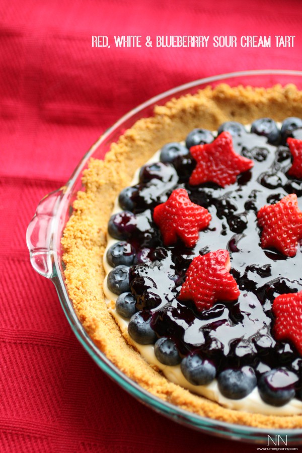 Red, White and Blueberry Sour Cream Tart by Nutmeg Nanny Blueberry Sour Cream Tart in a pie plate.