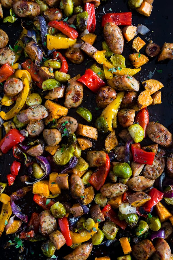This sheet pan chicken sausage and vegetables is the perfect weeknight meal. It's hearty, full of vegetables and ready in no time. Plus there is only one sheet pan to clean up! Your whole family will love this dish! 