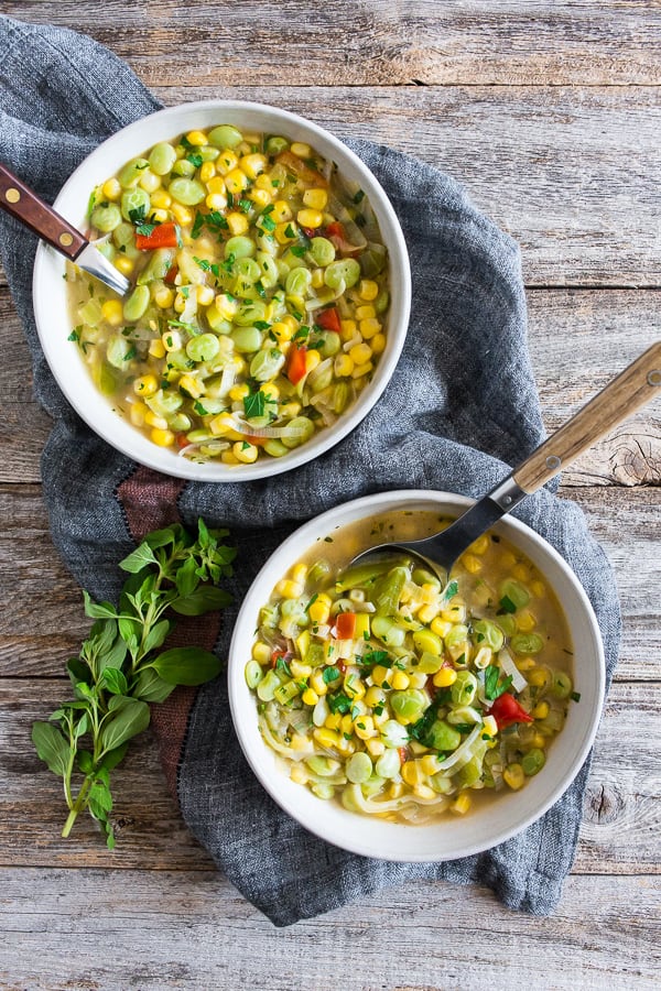 This super easy vegan and vegetarian succotash soup is packed full of lima beans, corn and fresh herbs. Ready in just 30 minutes and perfect for dinner or a light summer lunch. Trust me, you'll love this soup!