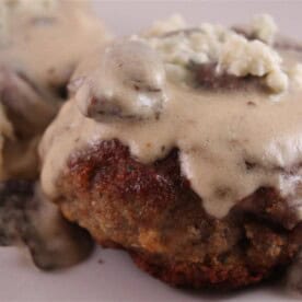 This veal and sage meatloaf with gorgonzola cream sauce is the perfect twist to your typical meatloaf dinner. Full of flavor and perfect when served with creamy mashed potatoes. You'll love this meal!