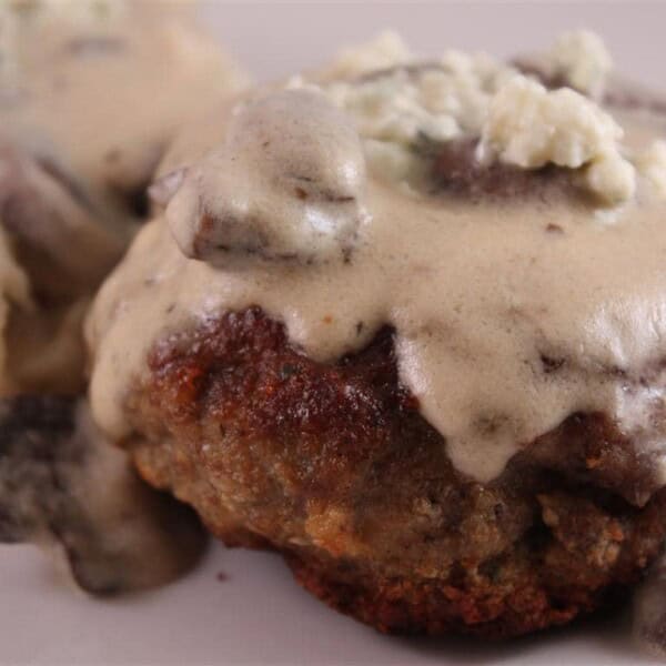 This veal and sage meatloaf with gorgonzola cream sauce is the perfect twist to your typical meatloaf dinner. Full of flavor and perfect when served with creamy mashed potatoes. You'll love this meal!