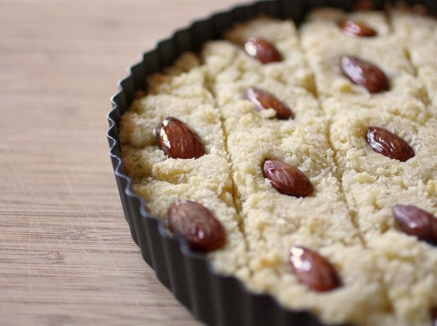 This basbousa is made with semolina flour, almonds, coconut and a delicious rose water scented sugar syrup. It's so delicious and so easy to make!