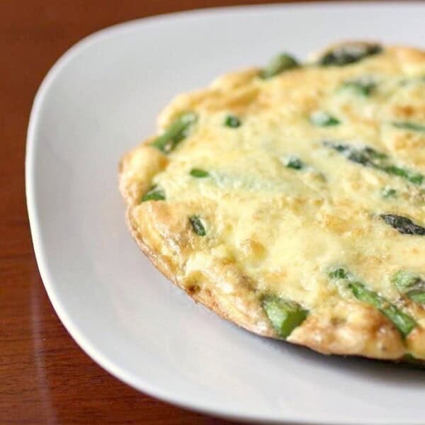 Need a breakfast for two? This tasty asparagus frittata is the perfect recipe. Packed full of fresh chopped asparagus, Parmesan cheese and sharp cheese.