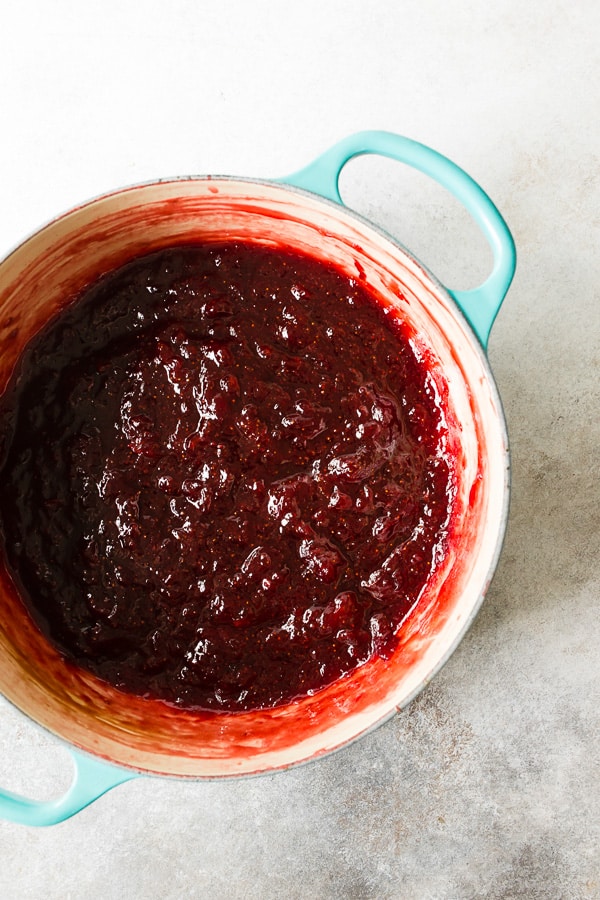 small cooking pot full of vanilla bean strawberry jam
