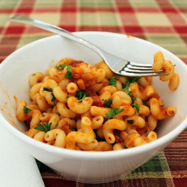 This pasta and pancetta in smoky tomato sauce is a classic dish with a delicious twist. Ready in just 30 minutes and packed with flavor. Your whole family will love this dish!