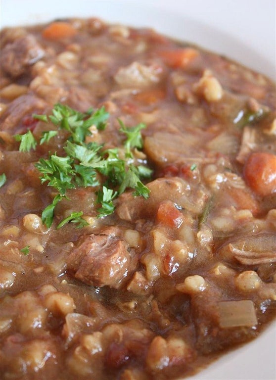 Slow Cooker Beef Barley Soup by Nutmeg Nanny A hearty slow cooker beef barley soup will stick to your bones and keep you full all winter long. It's packed full of vegetables, barley and beef.