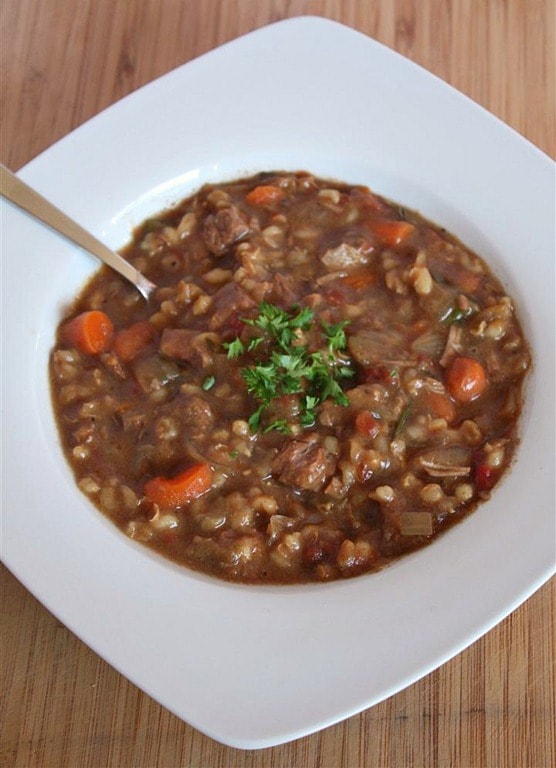 Slow Cooker Beef Barley Soup by Nutmeg Nanny A hearty slow cooker beef barley soup will stick to your bones and keep you full all winter long. It's packed full of vegetables, barley and beef.