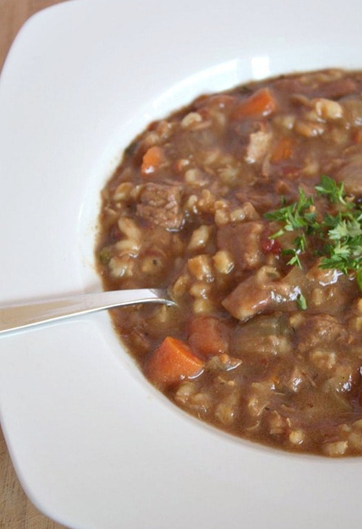 Slow Cooker Beef Barley Soup by Nutmeg Nanny A hearty slow cooker beef barley soup will stick to your bones and keep you full all winter long. It's packed full of vegetables, barley and beef.