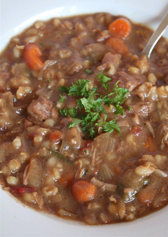 Slow Cooker Beef Barley Soup by Nutmeg Nanny A hearty slow cooker beef barley soup will stick to your bones and keep you full all winter long. It's packed full of vegetables, barley and beef.