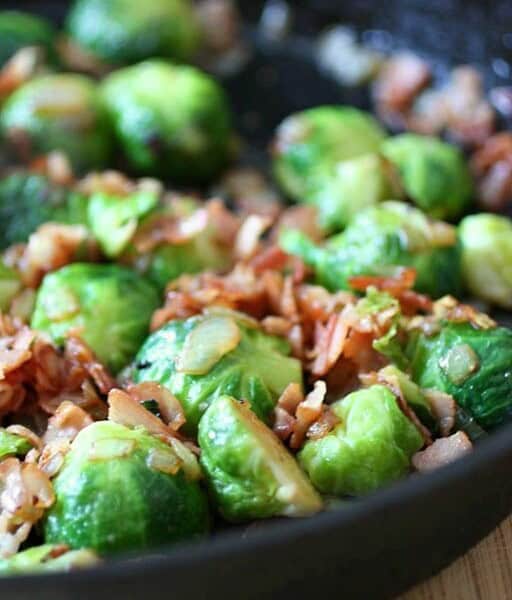 These super delicious Brussels sprouts with pancetta are the perfect vegetable side dish. Packed full of flavor and crispy bits of pancetta.