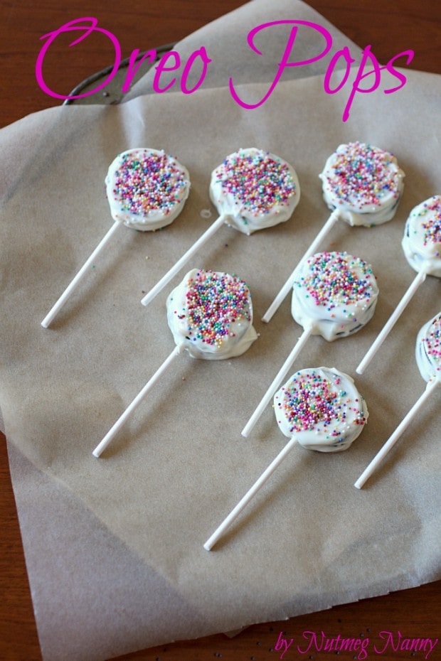 Oreo Pops by Nutmeg Nanny Oreo Pops sitting on parchment paper.