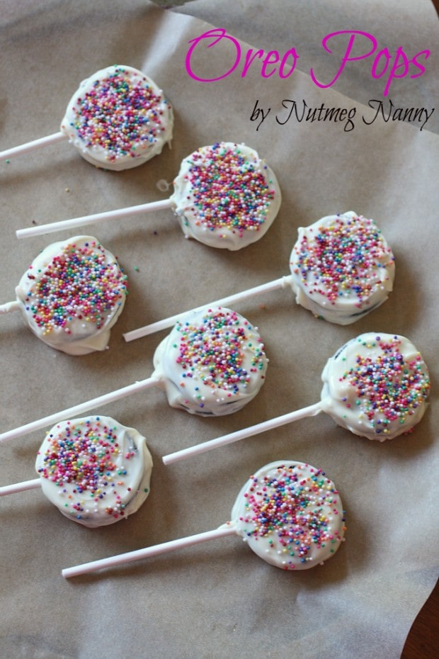 Oreo Pops by Nutmeg Nanny Oreo Pops covered in white chocolate and sprinkles.