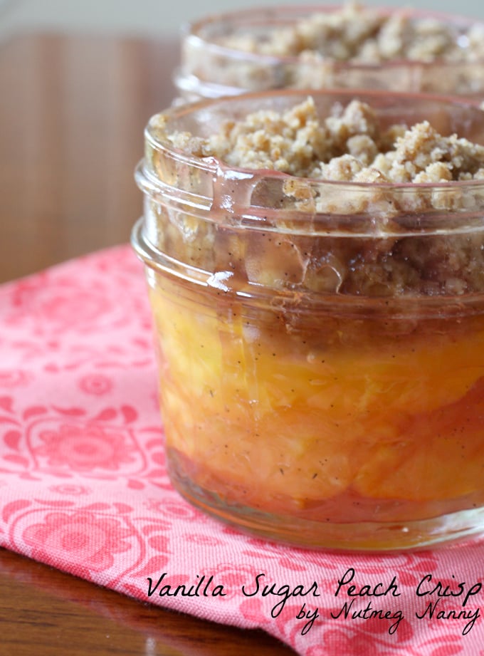 Vanilla Sugar Peach Crisp by Nutmeg Nanny This vanilla sugar peach crisp is baked in tiny mason jars and is the perfect combo of peaches and sweet vanilla sugar. Eat warm out of the oven or with a scoop of vanilla ice cream.