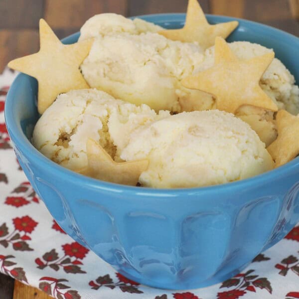 This pecan pie ice cream tastes just like pie but in ice cream form! Delicious vanilla ice cream mixed with a sweet pecan pie filling and decorated with little pie crust cookies. You'll love this sweet ice cream treat!