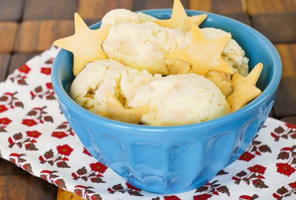 This pecan pie ice cream tastes just like pie but in ice cream form! Delicious vanilla ice cream mixed with a sweet pecan pie filling and decorated with little pie crust cookies. You'll love this sweet ice cream treat!