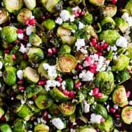 These super simple roasted Brussels sprouts with pomegranate seeds and goat cheese are the perfect dish for your Thanksgiving table. Easy to throw together and packed full of flavor! 