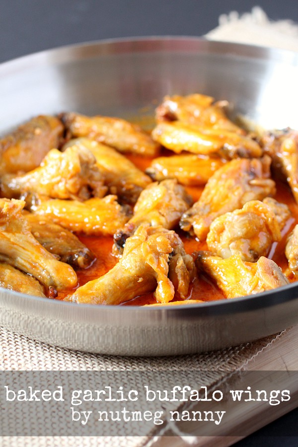 Baked Garlic Buffalo Wings in a skillet. 