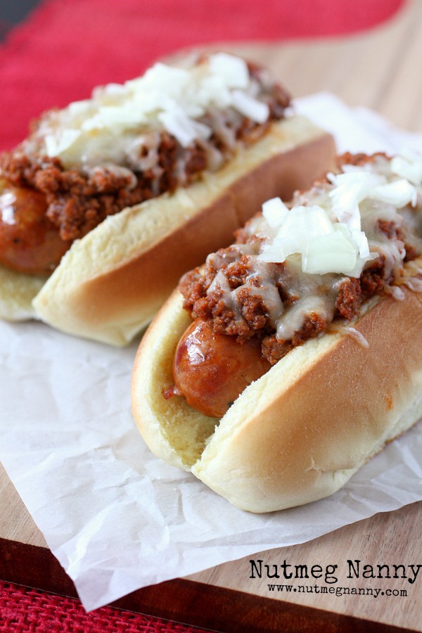 Andouille Chili Dog by Nutmeg Nanny These spicy andouille chili dogs are topped with a homemade chili meat sauce, cheese and just a sprinkling of onions. Spicy and delicious!