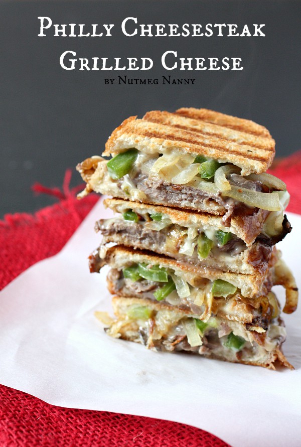 This Philly cheesesteak grilled cheese is packed with rare roast beef, onions, green peppers and lots of melty cheese. This is no boring grilled cheese!