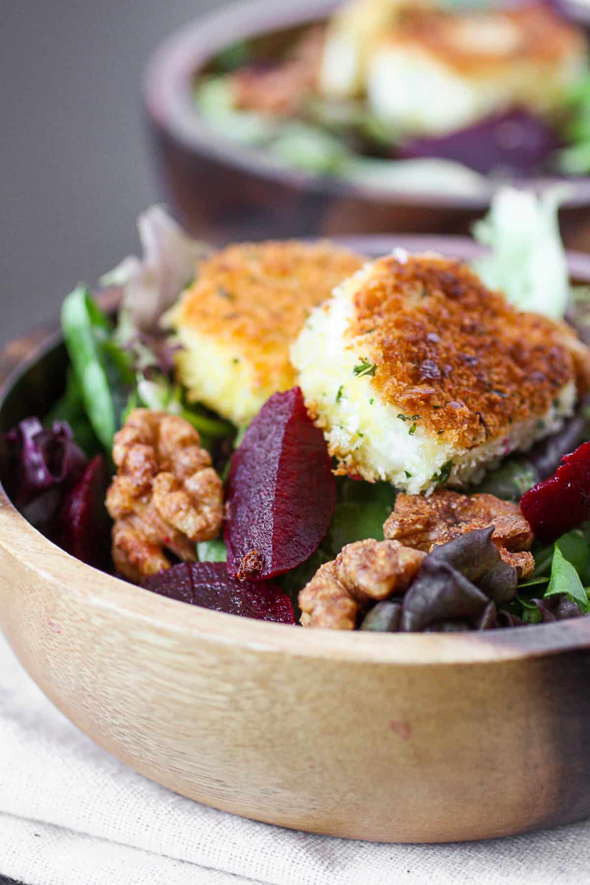 Fried Goat Cheese Salad served with beets and walnuts. 