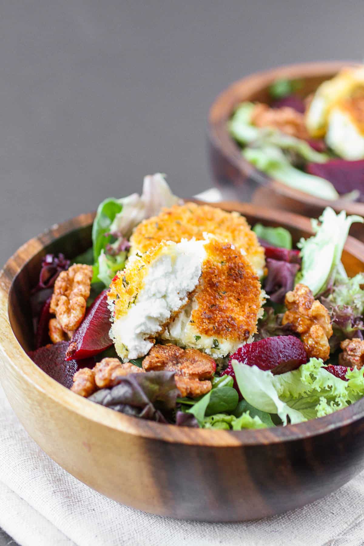 Fried Goat Cheese Salad in a salad bowl. 