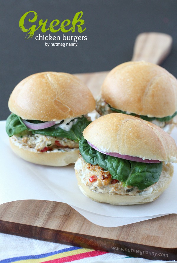 These Greek chicken burgers are slathered with Greek yogurt sauce and and homemade quick pickled red onions. This sandwich is packed full of flavor!