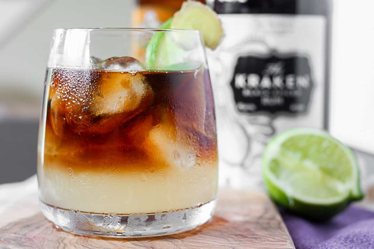Dark and Stormy Cocktail in a glass with ice. 