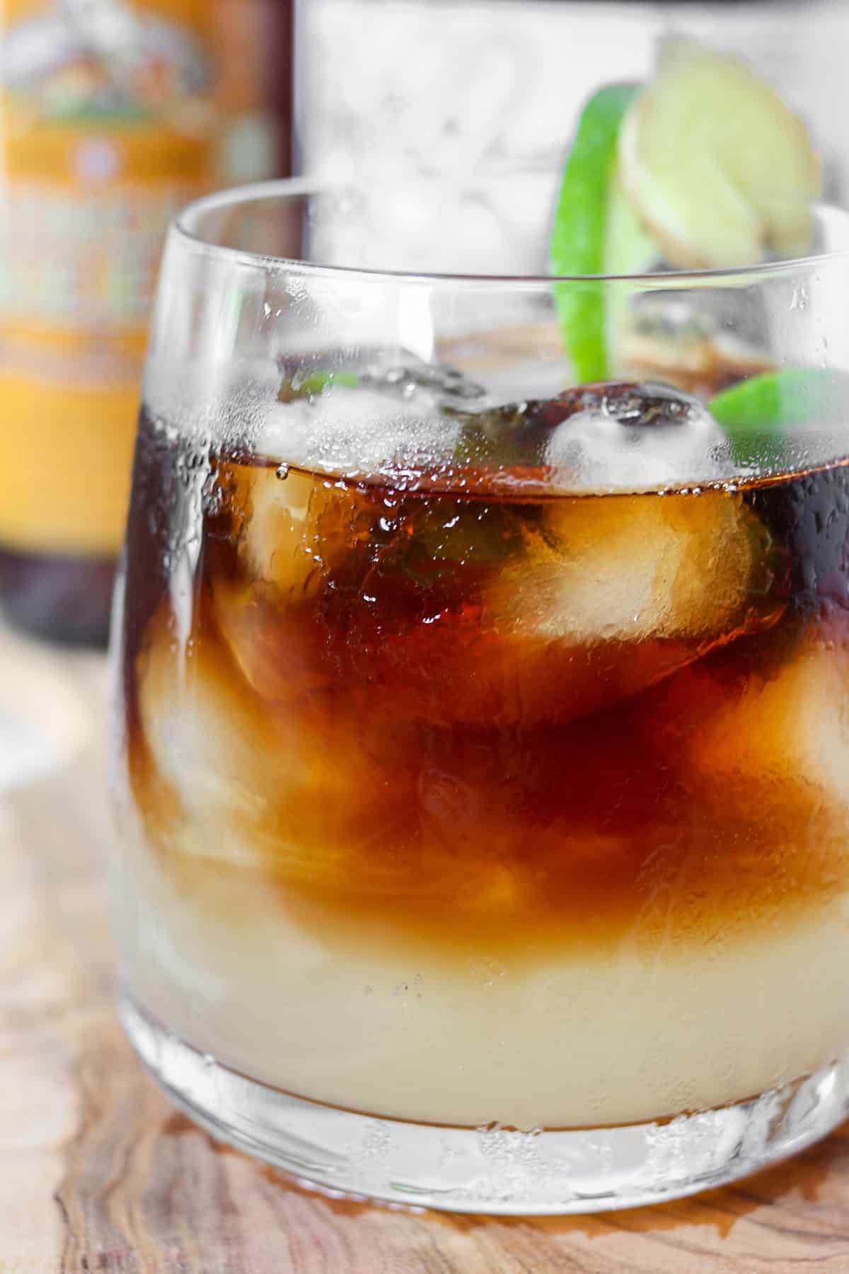 Dark and Stormy Cocktail layered in a glass. 