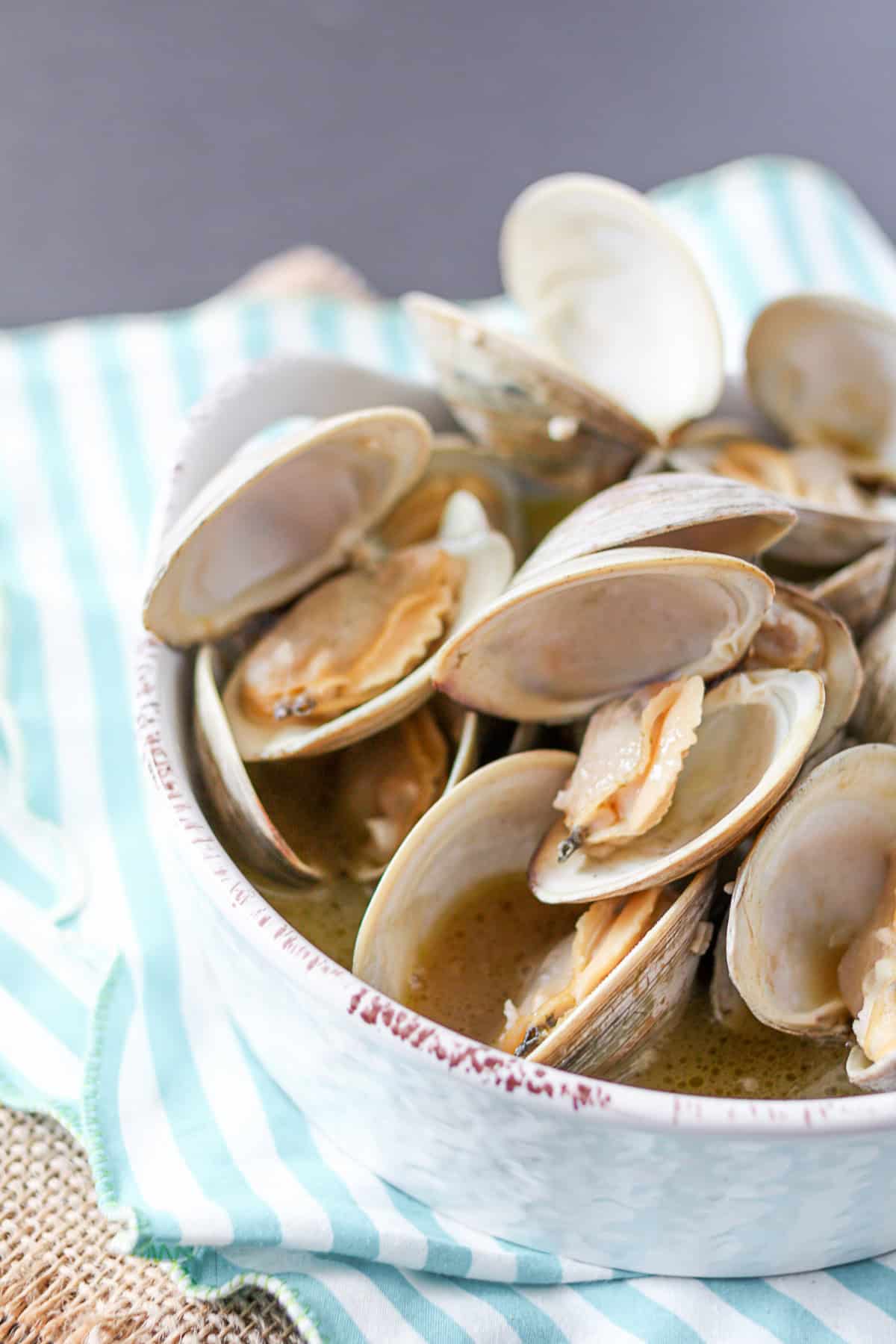 Beer Steamed Clams served with sauce. 