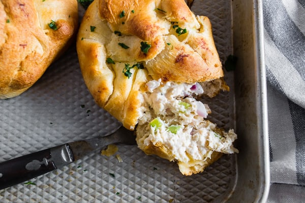 These chicken crescent packets are packed with shredded chicken, cream cheese, red onions, and celery. Super simple to make and ready in just 30 minutes! Trust me, you'll love this quick and easy dinner recipe!