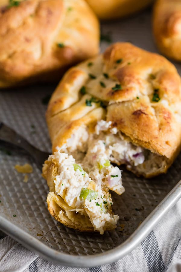 These chicken crescent packets are packed with shredded chicken, cream cheese, red onions, and celery. Super simple to make and ready in just 30 minutes! Trust me, you'll love this quick and easy dinner recipe!