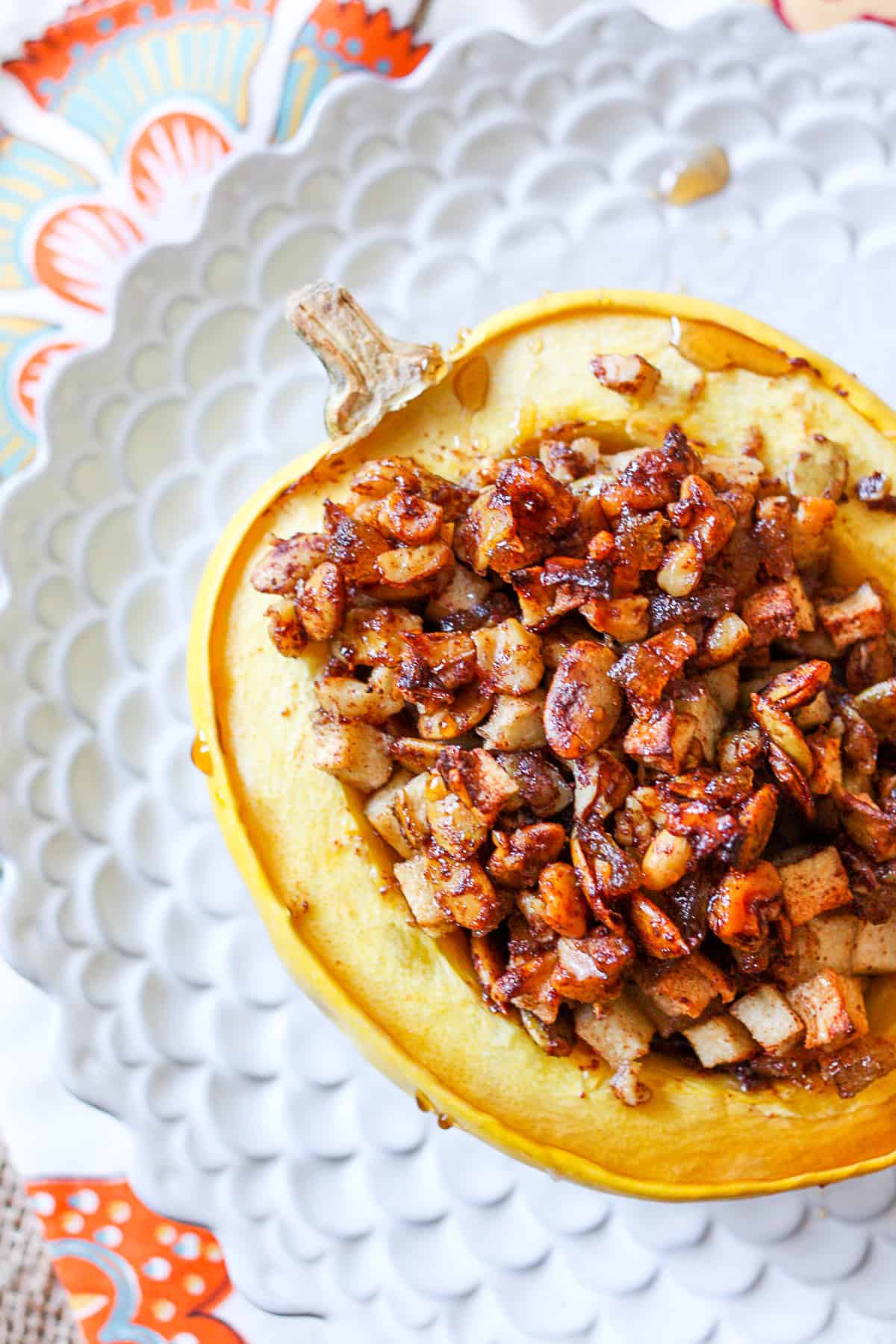 Stuffed Acorn Squash drizzled with maple syrup. 