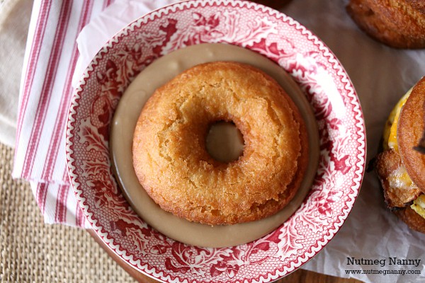 This doughnut breakfast sandwich combines homemade crispy doughnuts, eggs, bacon, cheese and lots of maple glaze. It's the perfect way to start your totally sweet day. 