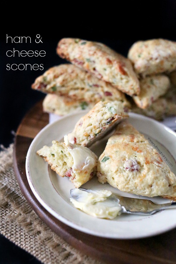 Ham and Cheese Scones by Nutmeg Nanny Ham and Cheese Scones on a plate with butter.