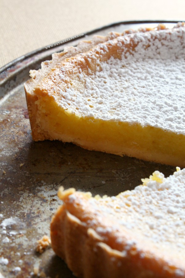 This sweet and tart whole Meyer lemon tart is the perfect addition to your dessert table. Slightly sweet and full of lemon flavor it's sure to impress.