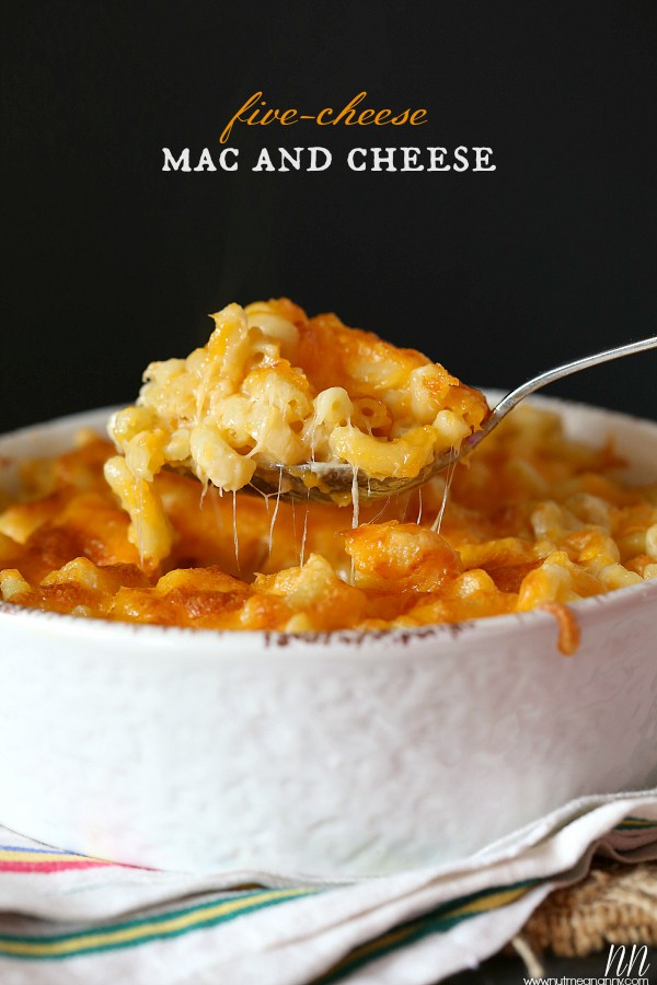 Five-Cheese Mac and Cheese by Nutmeg Nanny Five Cheese Mac and Cheese being scooped with a cheese pull.