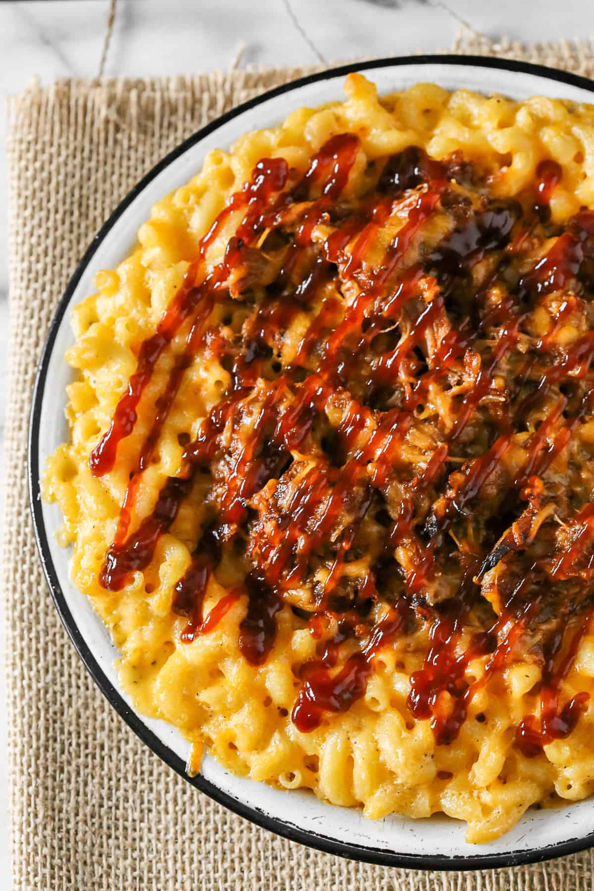 pulled pork mac and cheese on a table. 