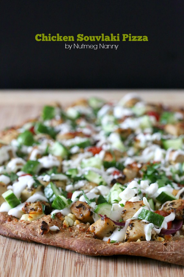 Chicken Souvlaki Pizza on a cutting board. 