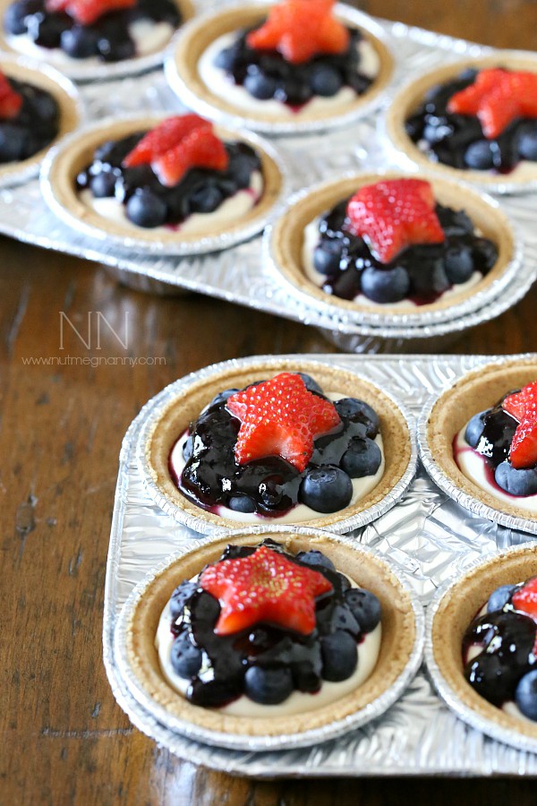 No Bake Blueberry Cheesecake in mini graham cracker crusts. 