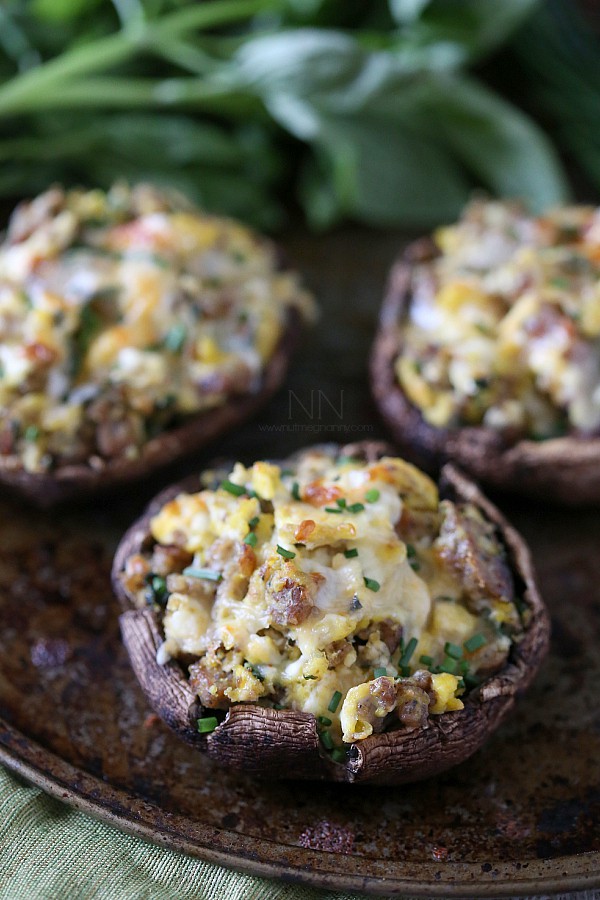 Breakfast Stuffed Mushrooms by Nutmeg Nanny Breakfast Stuffed Mushrooms topped with chives.