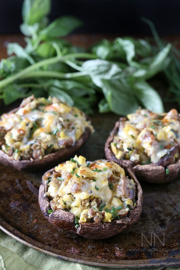 Breakfast Stuffed Mushrooms by Nutmeg Nanny Breakfast Stuffed Mushrooms served with herbs.