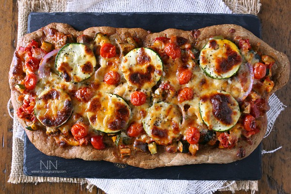 Ratatouille Pizza topped with cheese.