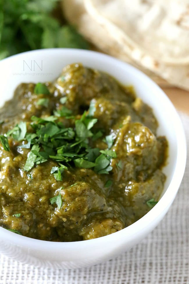 Pork Chile Verde in a white bowl. 